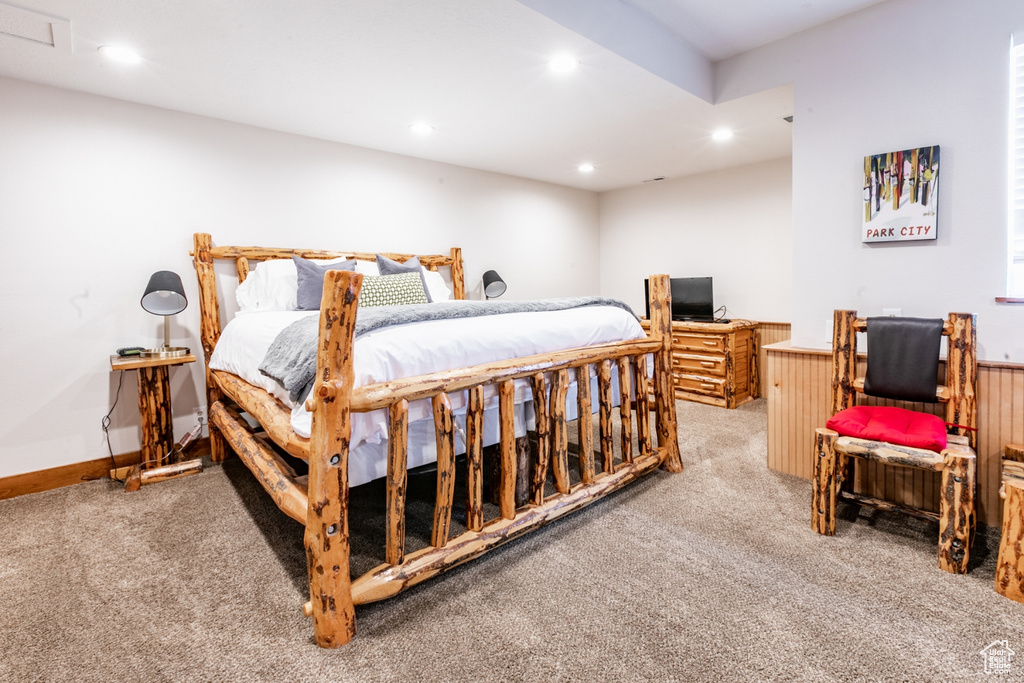 Bedroom featuring carpet