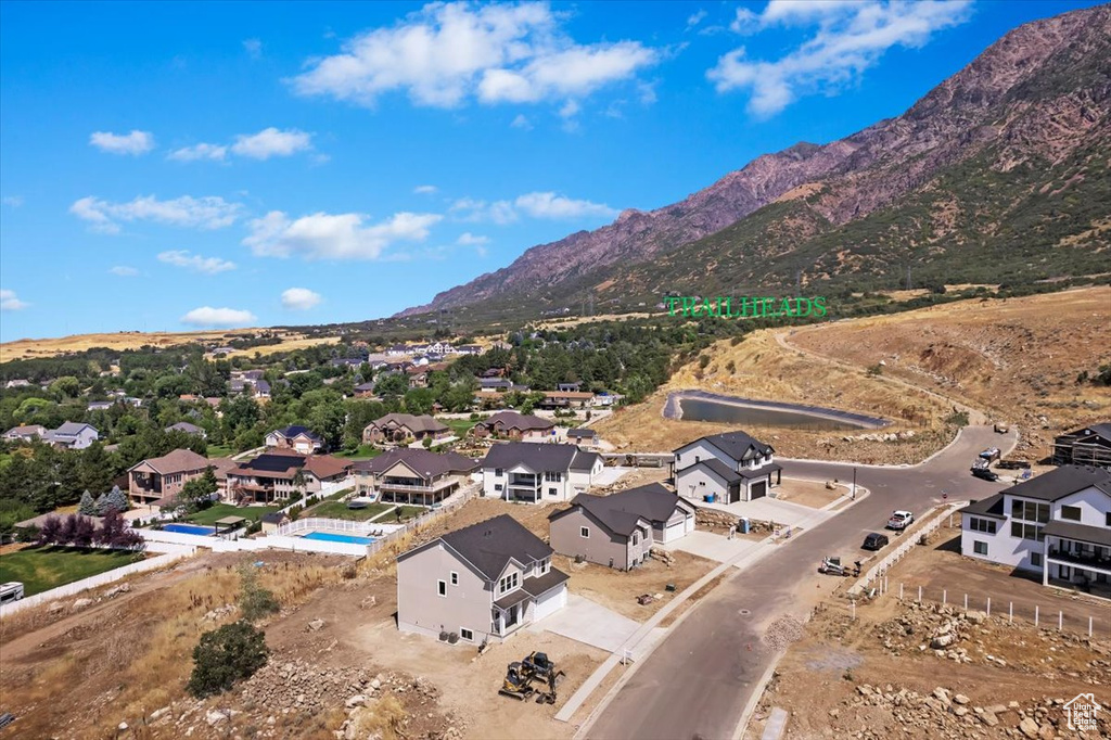 Birds eye view of property featuring a mountain view