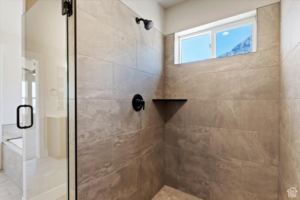 Bathroom with an enclosed shower