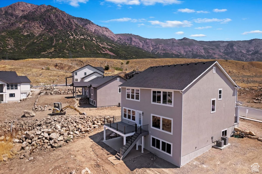 Exterior space featuring a mountain view