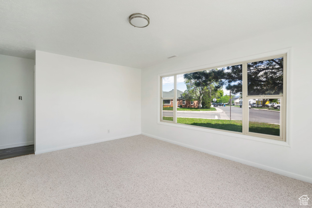 Spare room with carpet floors