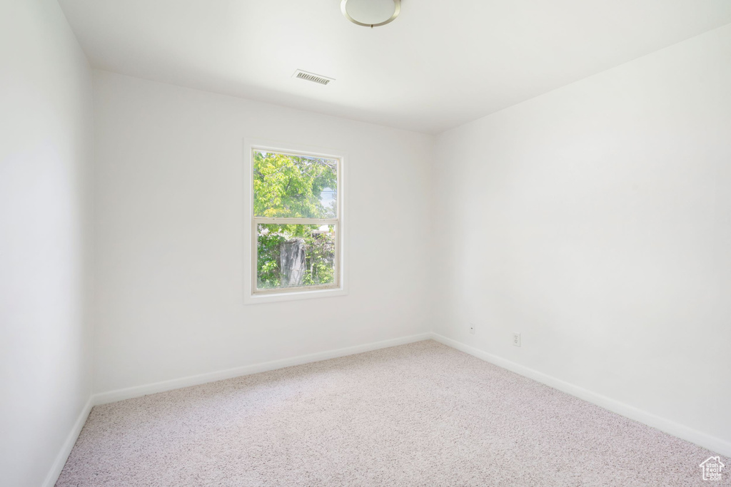 View of carpeted spare room