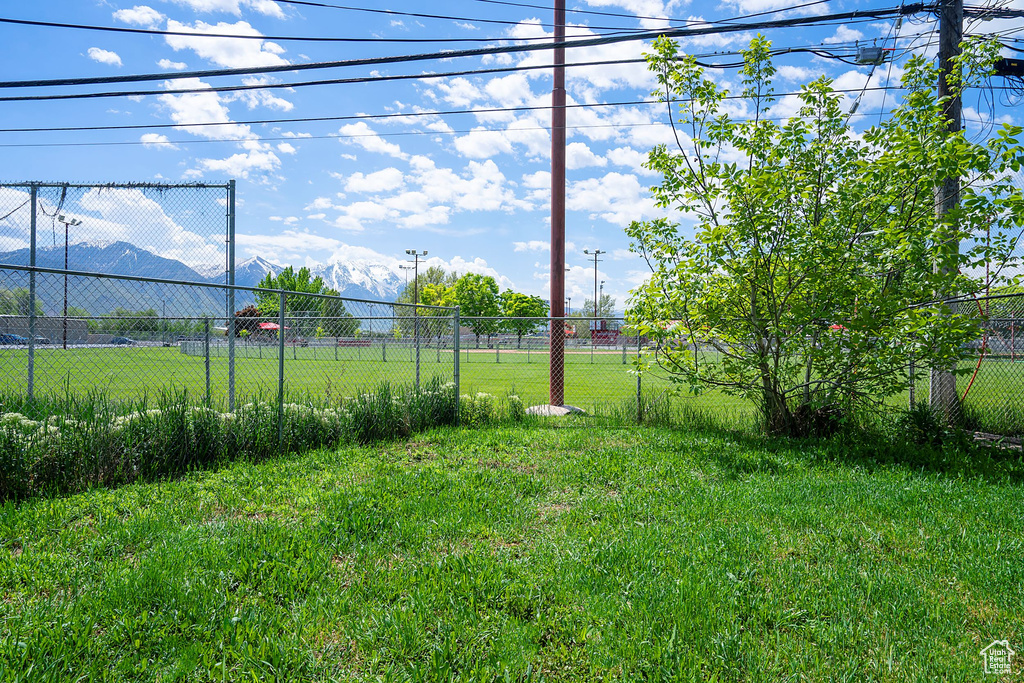 View of yard with a mountain view