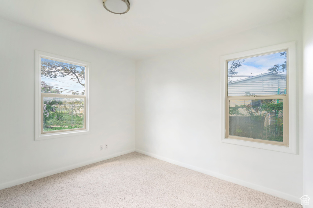 Empty room featuring carpet