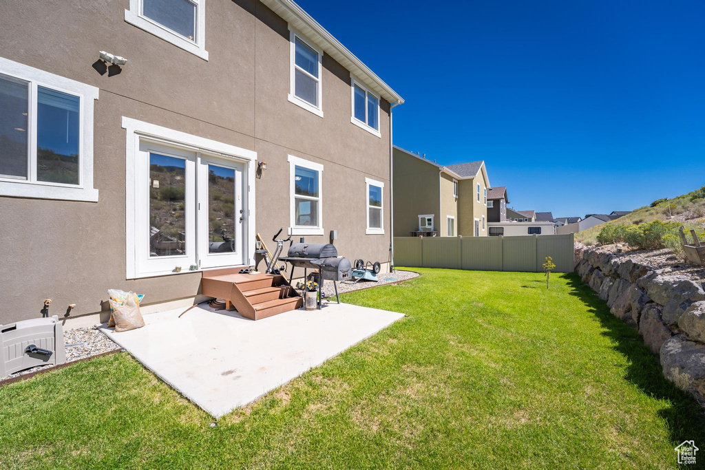 View of yard with a patio