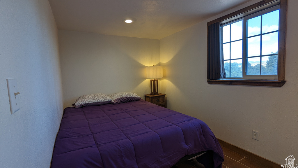 Bedroom featuring hardwood / wood-style flooring