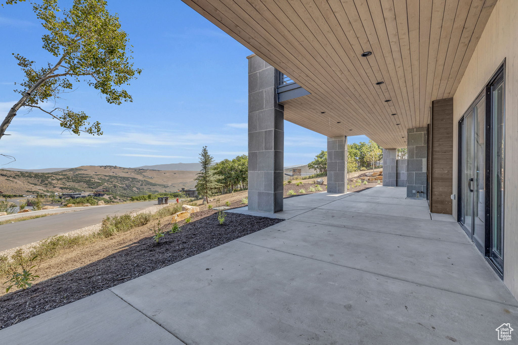 View of patio featuring a mountain view