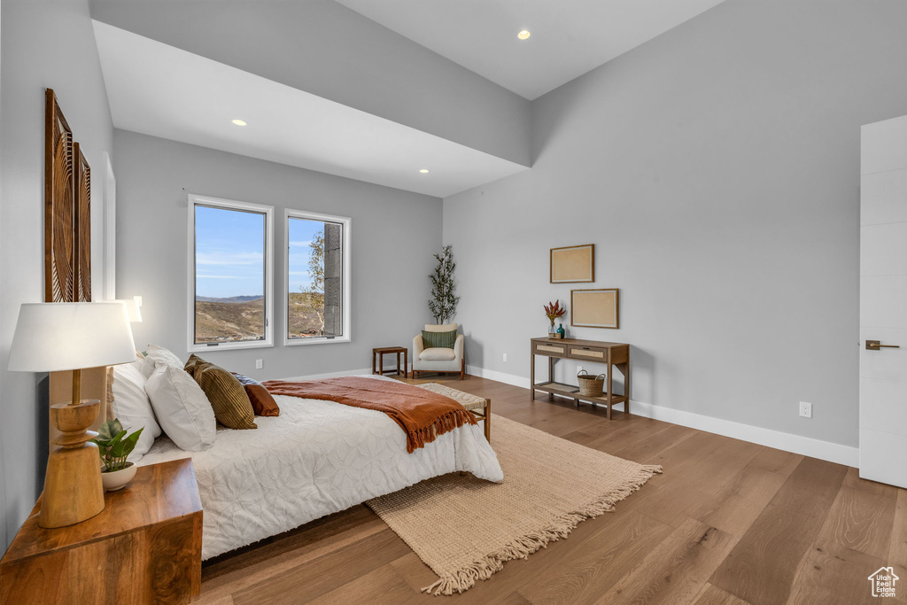 Bedroom featuring hardwood / wood-style flooring