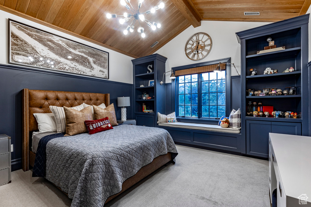 Bedroom with a notable chandelier, lofted ceiling with beams, light carpet, and wood ceiling