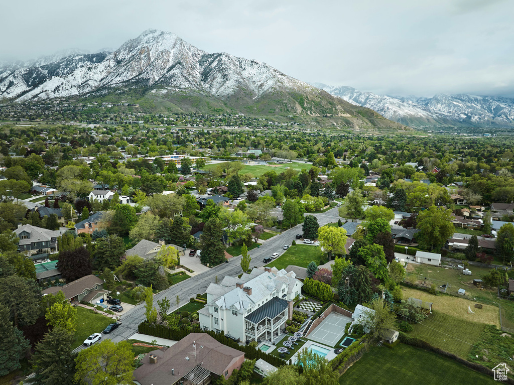 Birds eye view of property with a mountain view