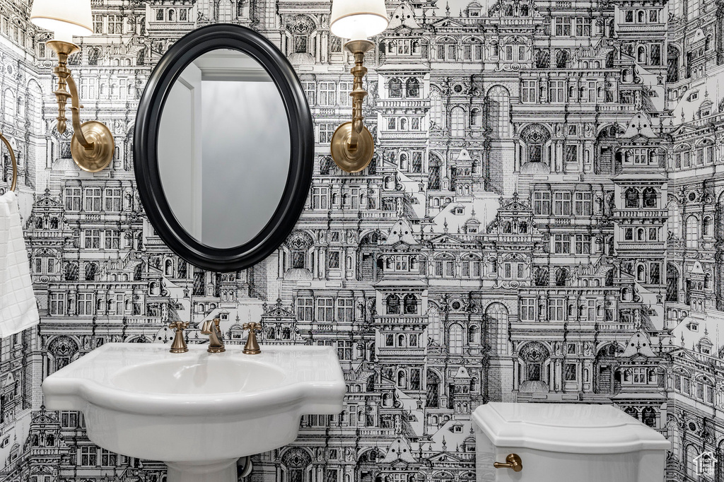 Bathroom with tile walls and toilet