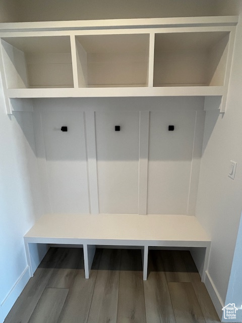 Mudroom with hardwood / wood-style floors