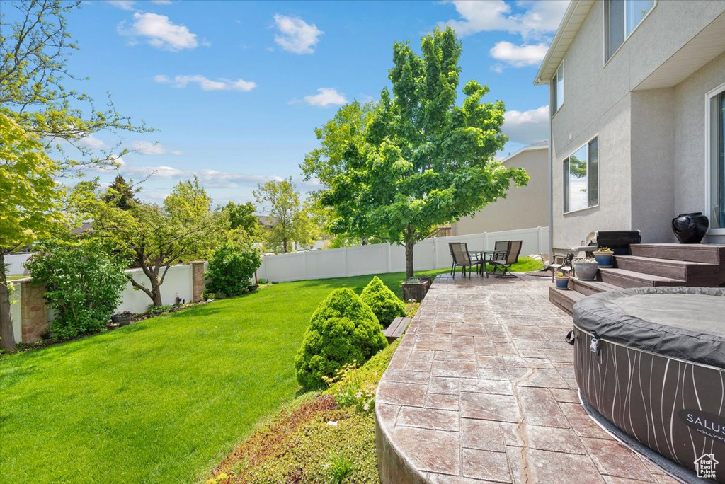 View of yard with a patio area