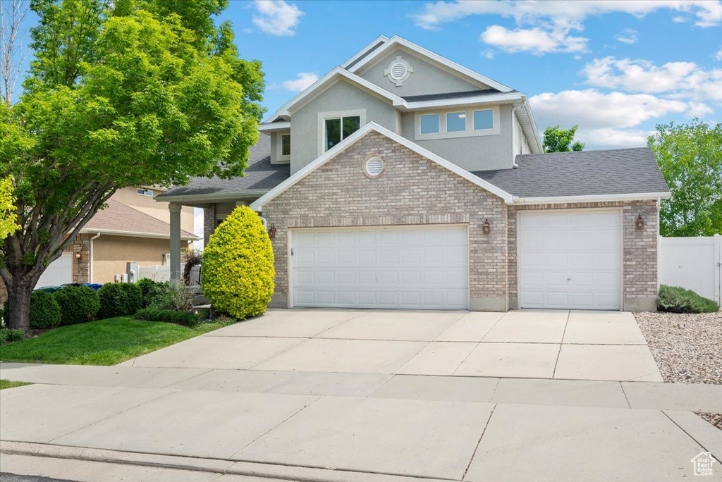 Front of property featuring a garage