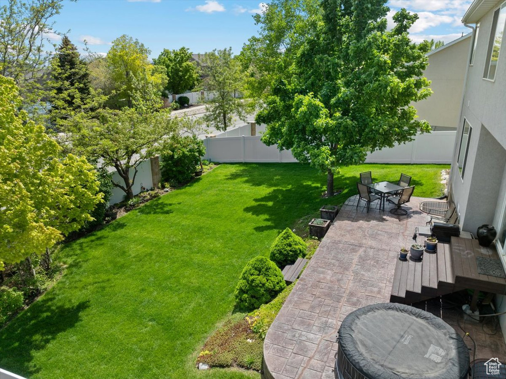 View of yard with a patio area