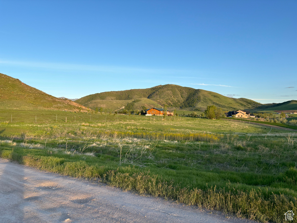 View of mountain feature with a rural view