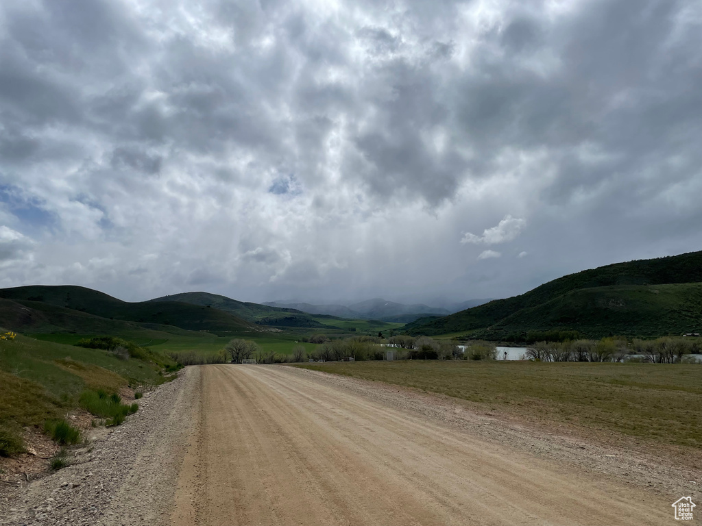 View of road featuring a rural view and a mountain view