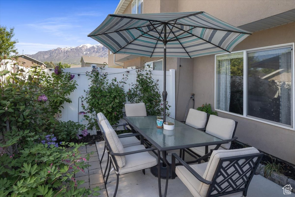 View of terrace featuring a mountain view