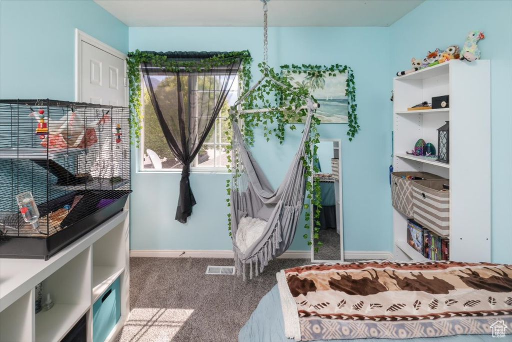 Bedroom with carpet flooring