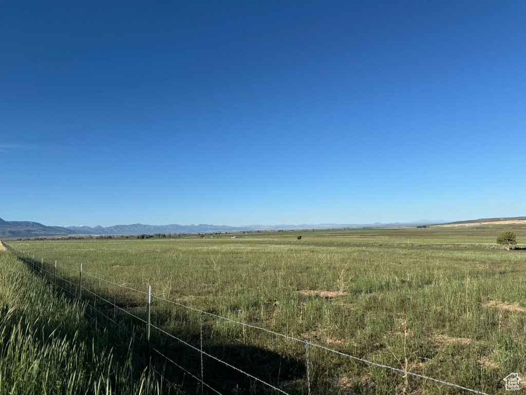 View of nature featuring a mountain view and a rural view