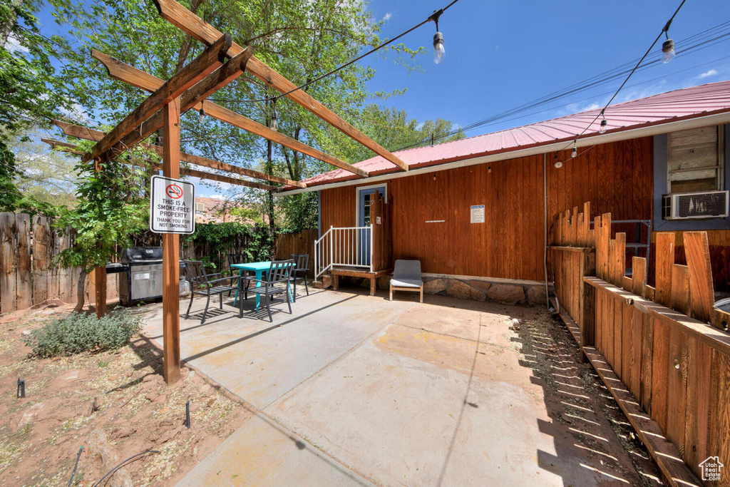 View of patio with a pergola