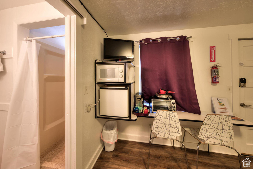 Bathroom with wood-type flooring