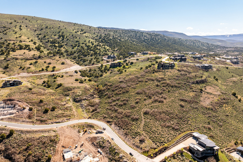 Birds eye view of property featuring a mountain view