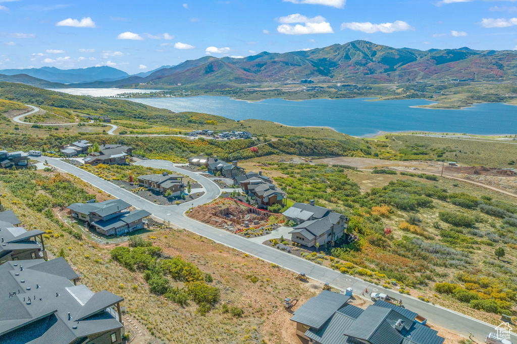 Bird's eye view with a water and mountain view