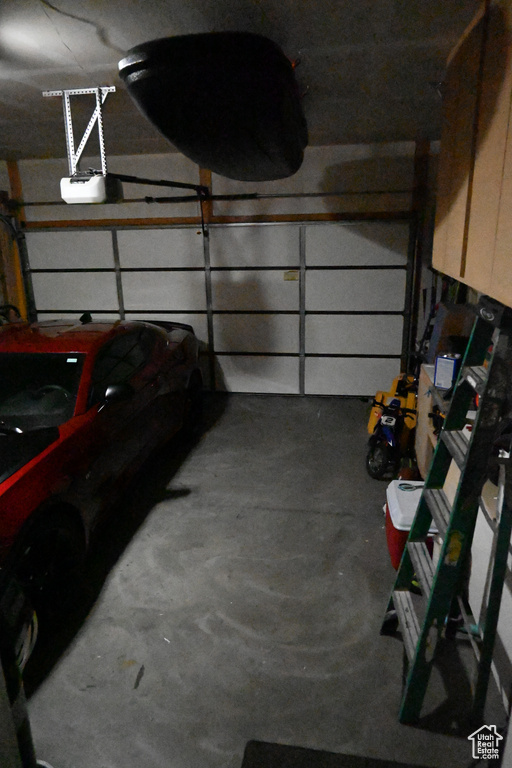 Garage featuring a garage door opener