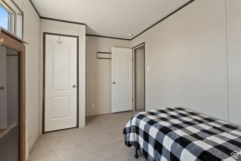 View of carpeted bedroom