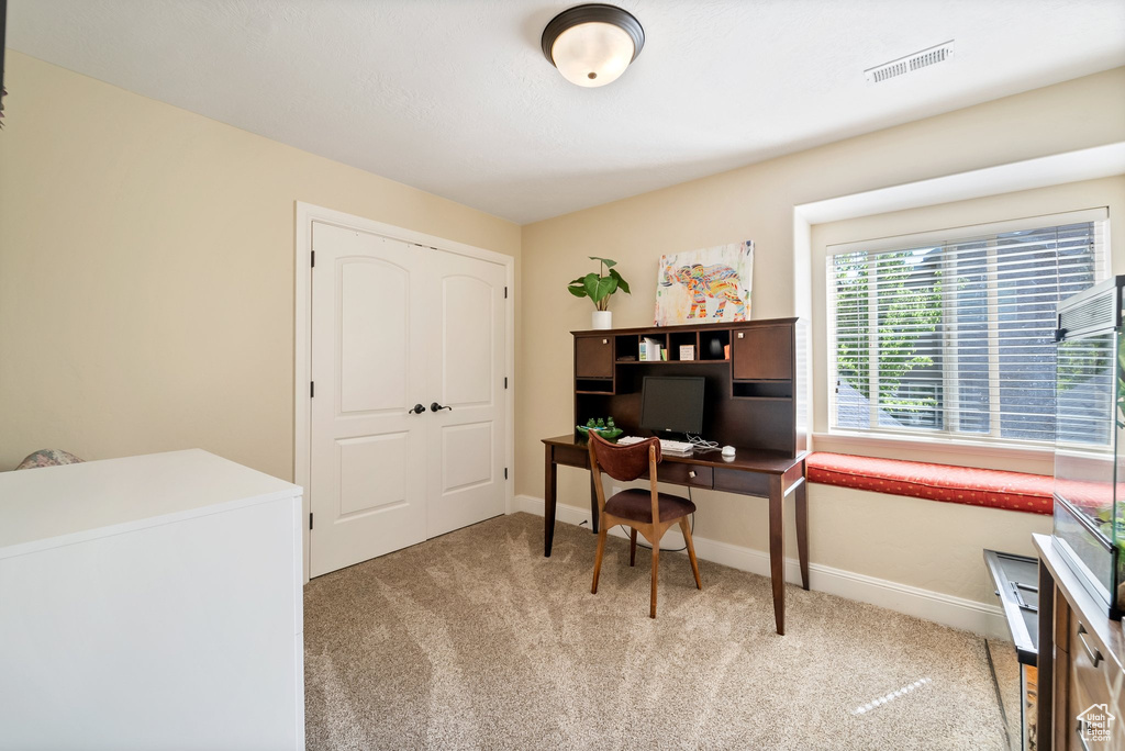 View of carpeted home office