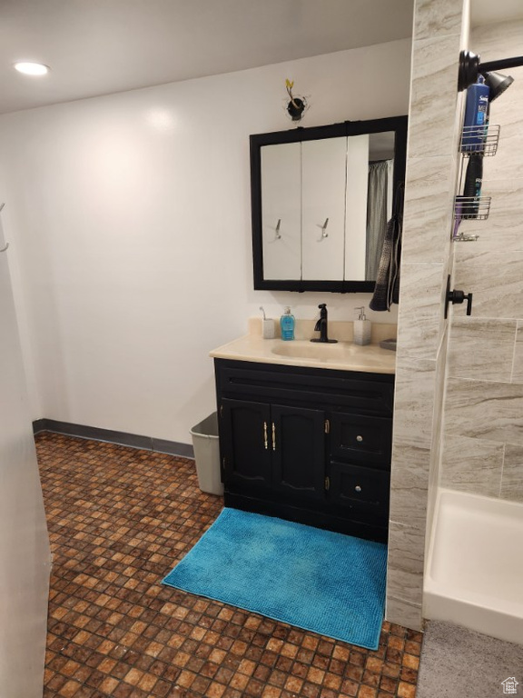 Bathroom with tile floors and oversized vanity