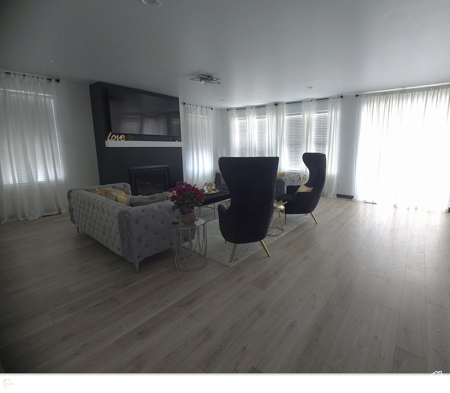 Living room featuring hardwood / wood-style flooring