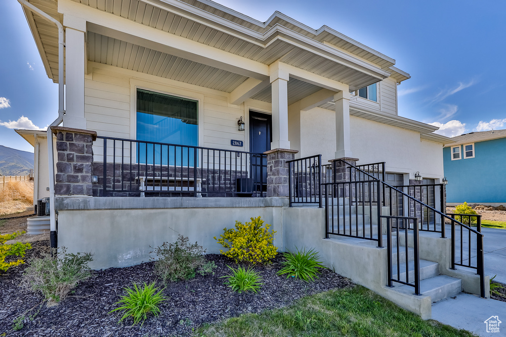 View of front of property with a porch