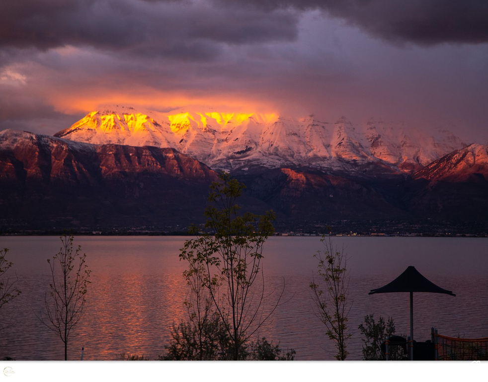 View of water feature with a mountain view