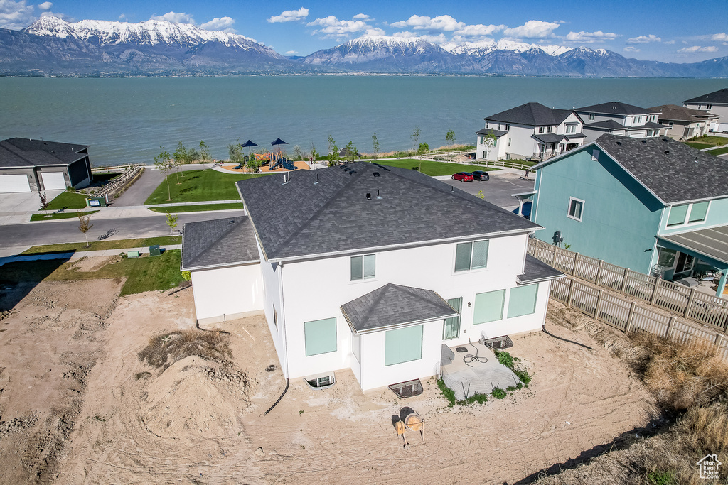 Bird\'s eye view featuring a water and mountain view