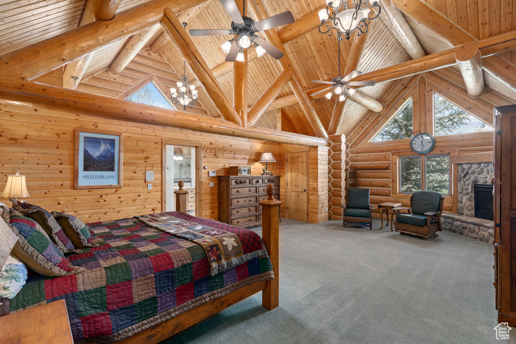 Carpeted bedroom featuring a stone fireplace, beam ceiling, wood ceiling, high vaulted ceiling, and log walls