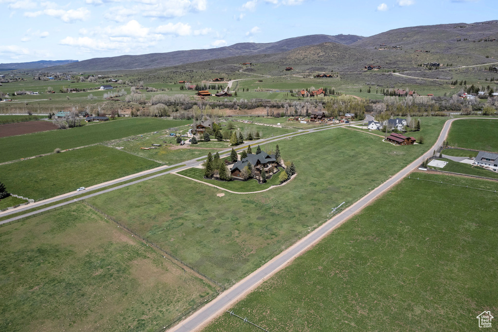 Drone / aerial view featuring a mountain view and a rural view