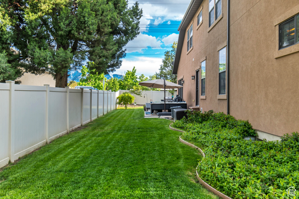 View of yard featuring an outdoor hangout area and a patio area