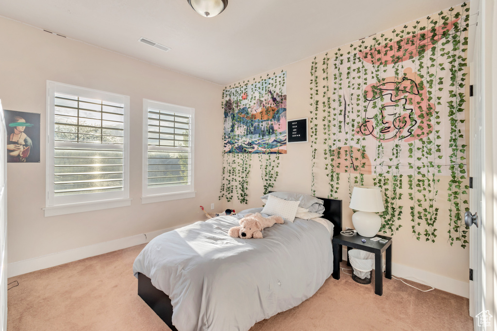 Bedroom with carpet