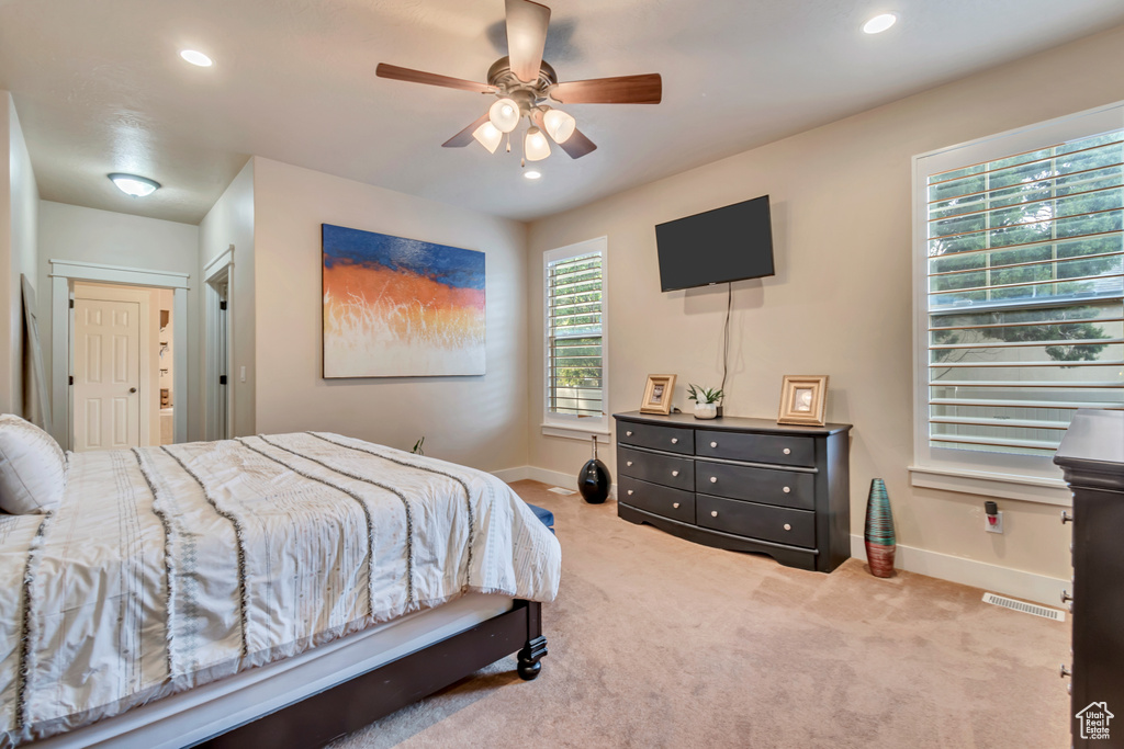 Bedroom featuring carpet floors and ceiling fan