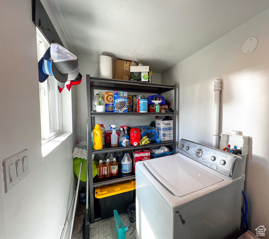 Laundry area featuring washer / dryer