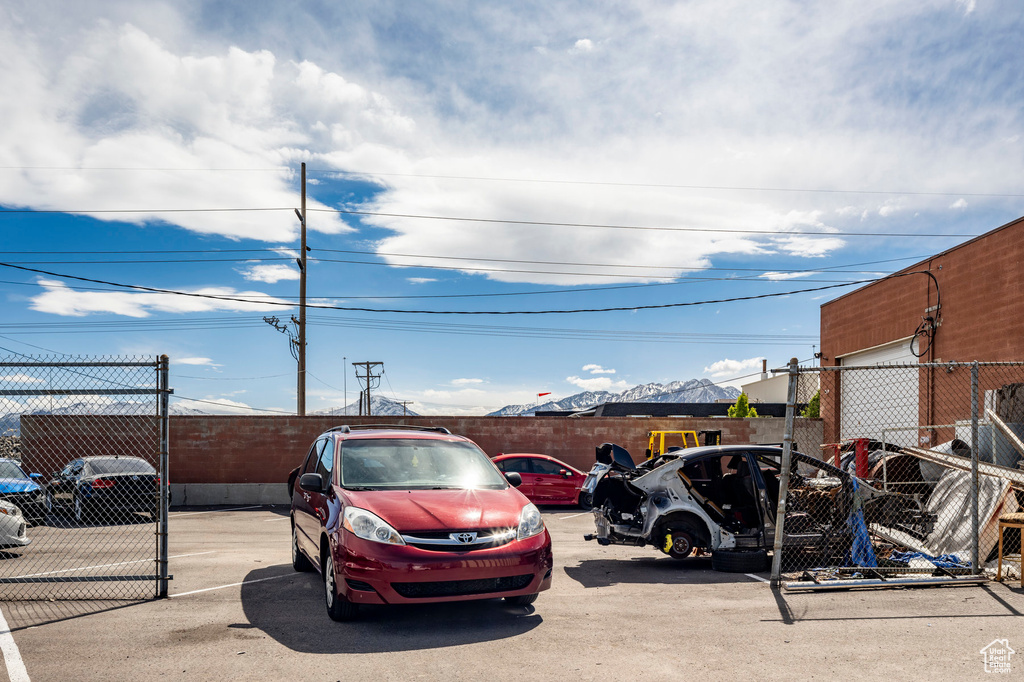 View of vehicle parking with a mountain view