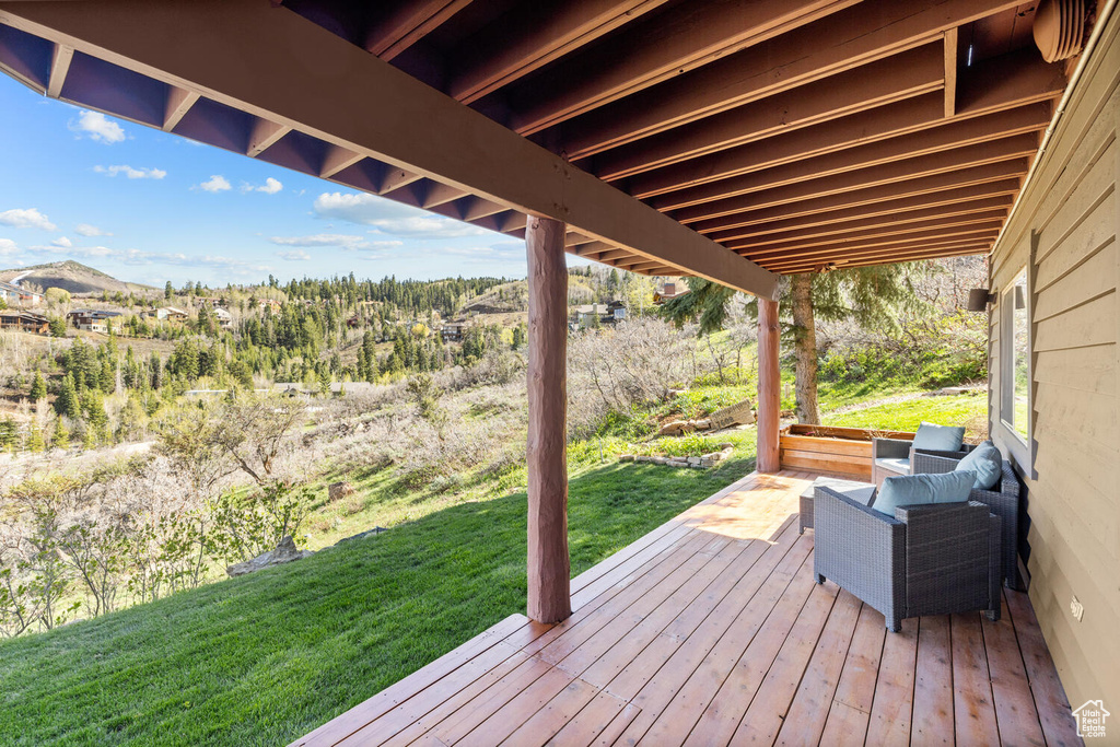 Wooden deck with a yard