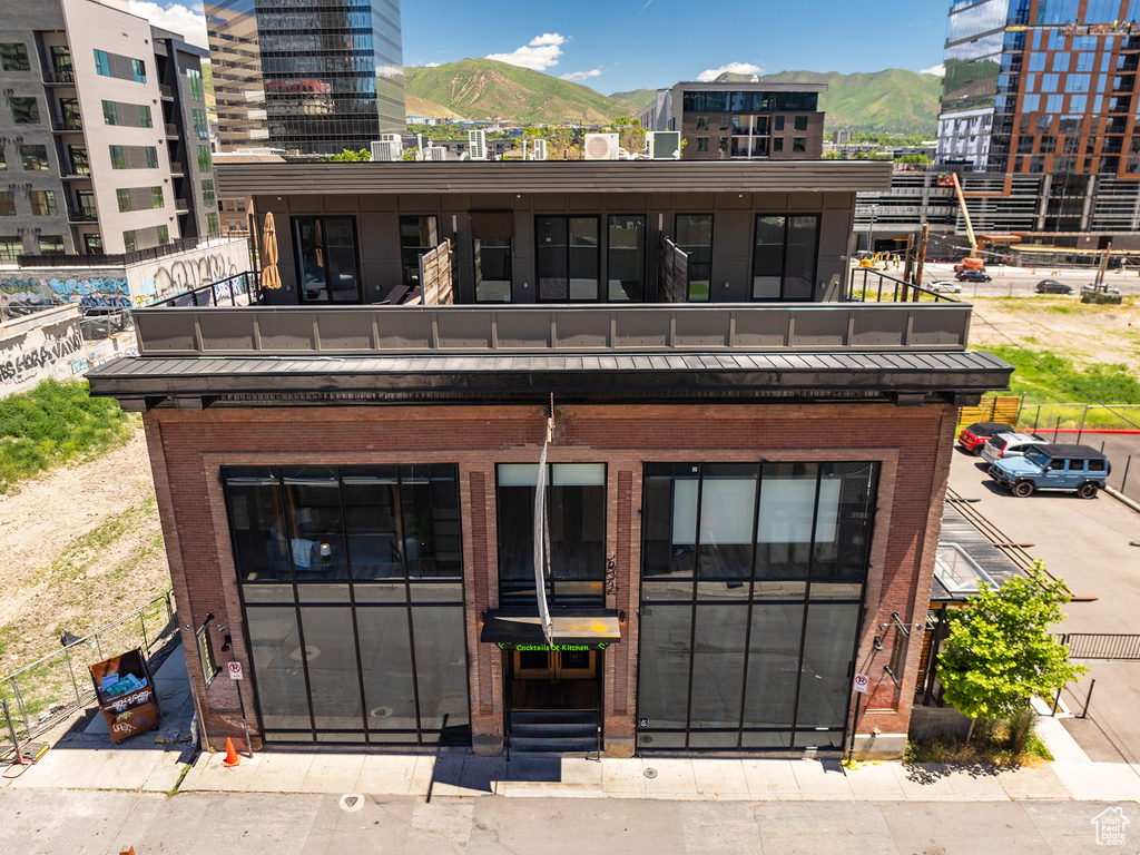 Exterior space featuring a mountain view