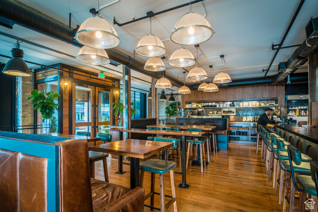 Dining area with light hardwood / wood-style floors