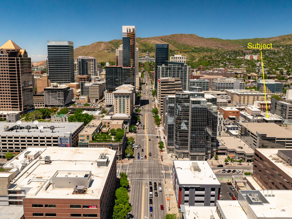 Property's view of city with a mountain view