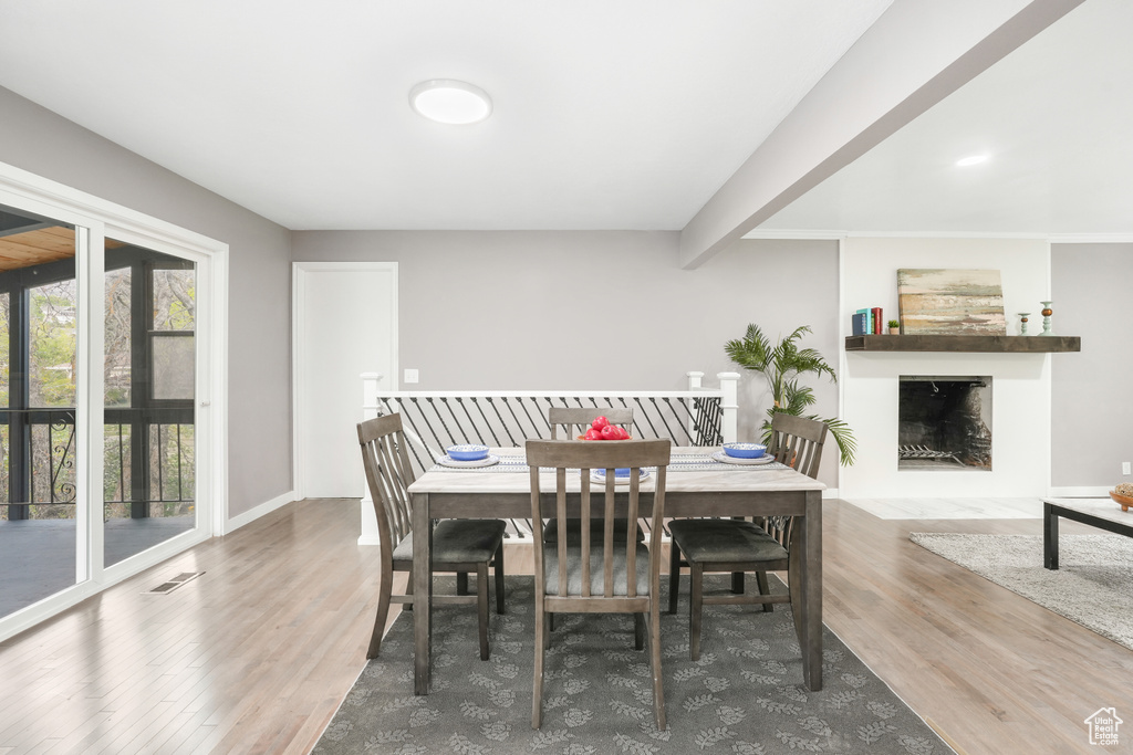 Dining space featuring hardwood / wood-style flooring