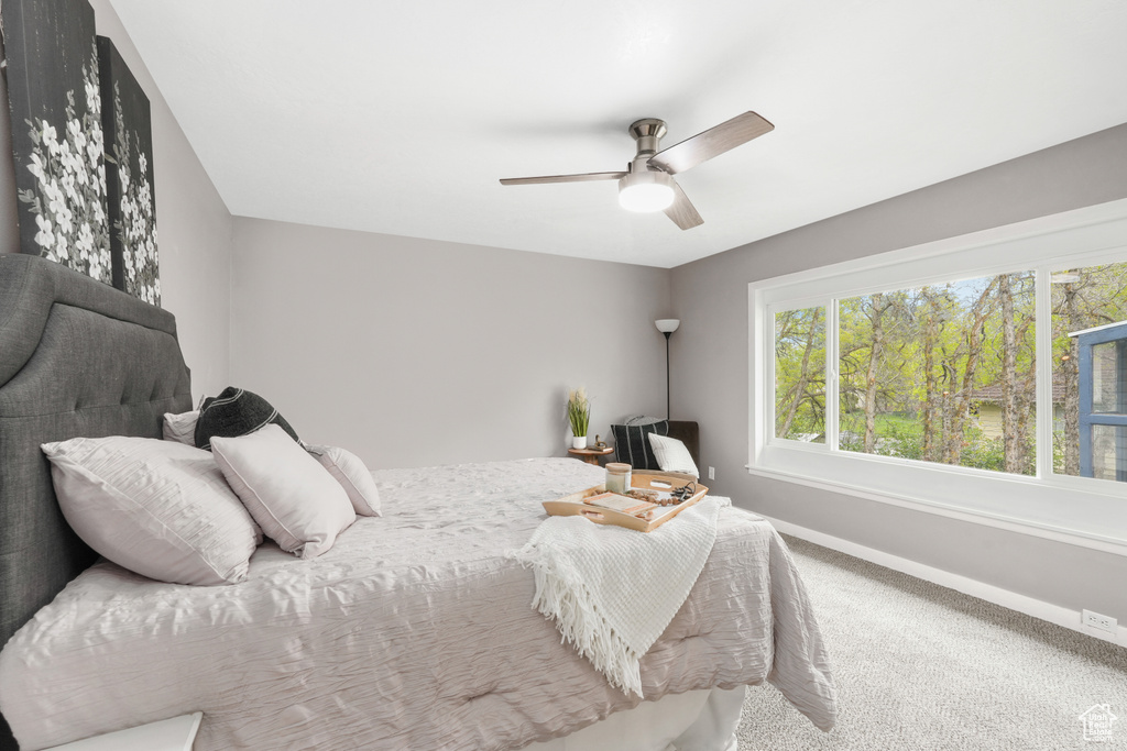 Bedroom with carpet floors and ceiling fan