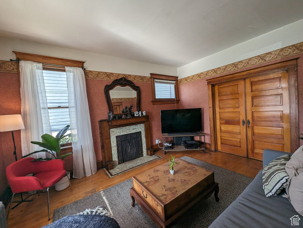 Living room with hardwood / wood-style floors